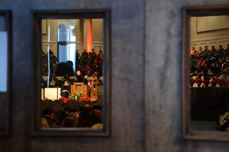 With the church full, many people peeked through the back doors to see their friends and loved ones graduate at the 2011 Fall Commencement Services.