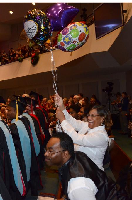 Family and friends cheer for graduates during the 2011 Fall Commencement Services.