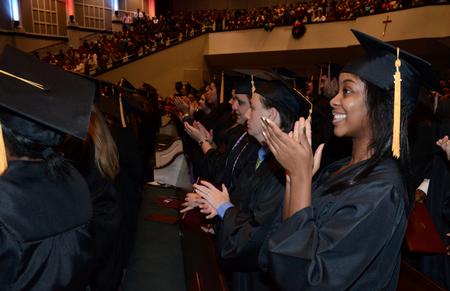 Graduates applaud during the 2011 Fall Commencement Services held at West Jackson Baptist Church.