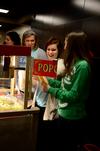 Amiee Brassart, sophomore special education major, Meredith Holden, freshman English major, and Samantha Adams, junior public relations major, prepare snacks for Movie in the Bowld sponsored by SAC.  - Photo by Anne Richoux