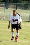 Cassandra Ramos (6) breaks toward the ball from her right field position. - Photo by Steven Aldridge