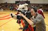 Buster the Bulldog helps Devin Hall, freshman theatre/speech major, count down a broadcast during Union Nation Spirit Night. - Photo by Jacob Moore