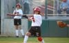 Cassandra Ramos (6) makes contact as she drives the ball to the opposite field for a hit during a Union over Cumberland. - Photo by Heidi Davis