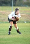Allison Shein (2) gets in her defensive postion in her usual spot in left field. - Photo by Heidi Davis