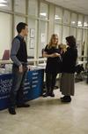 Jordan Sharp, senior applied linguistics major, talks with Opal Leeman Bartzis, field director for the Institute for Study Abroad at Butler University, and Victoria Malone, professor of language, at the external study fair. - Photo by Anne Richoux