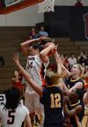 Shelby Ashcraft attempts to rebound during a game against Blue Mountain College in the opening round of the TranSouth Athletic Conference Championship. - Photo by Jacob Moore