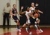 Lavanda Ross defends against 'Bam Bam' Robinson of Blue Mountain College. - Photo by Jacob Moore