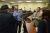 Garrett Hubbard, visual journalist for <em>USA TODAY</em>, greets Troy Martin after speaking at the Town & Gown lecture series while Michael Chute, director for the Center for Media, Faith, and Culture, and Brittney Julian, sophomore psychology major look on. - Photo by Jacob Moore
