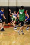 Matthew McSwain, sophomore athletic training major, guards Chad Buckley, senior history major, during a men's upper division intramural basketball game.  - Photo by Anne Richoux