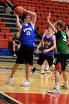 Jared Haney, sophomore business administration major, looks for a teammate to pass the ball to during an intramural game. - Photo by Anne Richoux