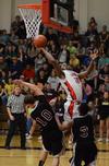 Antoine Hall goes up for a shot against Freed Hardeman University during the opening round of the TranSouth Athletic Conference Championship. - Photo by Jacob Moore