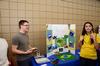 Curtis Schulz, junior applied linguistics major, and Nadja Barros, junior nursing major, show their Brazil display to Union students and employees during CultureFEST. - Photo by Zac Calvert
