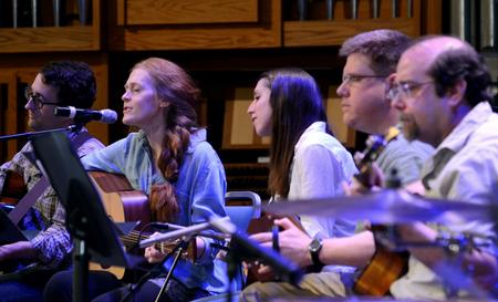 Members of Christ Community Church lead music during chapel.