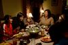 Ashley Jackson, resident director, enjoys a meal with several Union students during Be Our Guest, an event where faculty and staff invite students over for a home-cooked meal. - Photo by Ebbie Davis