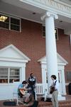Students play music outside of the Bowld Student Commons on one of the first warm days of Spring. - Photo by Ebbie Davis