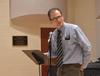 Dr. Bobby Rogers introduces  Pulitzer Prize-winning poet Carl Dennis . - Photo by Morris Abernathy