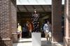 Danielle Sumler, sophomore DMS major, stands in the SUB hallway for a 3D art project. - Photo by Zac Calvert
