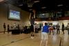 Cody Styx (middle), sophomore business administration major, participates in a basketball competition while watching the NCAA men's basketball national championship game in the Bowld Student Commons.  - Photo by Anne Richoux