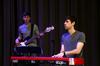 Brad Carrington (right), senior church music major, and Andrew Key, sophomore broadcast journalism major, help lead worship during chapel.  - Photo by Anne Richoux