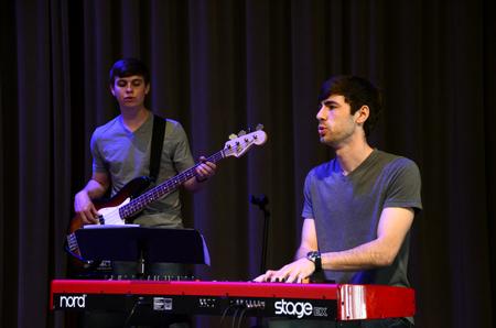 Brad Carrington (right), senior church music major, and Andrew Key, sophomore broadcast journalism major, help lead worship during chapel. 
