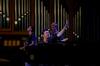 Jordan Pratt (left), senior psychology major, and Ben Wilson (right), senior chemistry major, lead worship along with Travis Cottrell, worship pastor at Englewood Baptist Church. - Photo by Anne Richoux