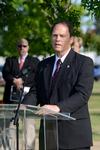 Gary Carter, senior vice president for business services, gives a dedicatory reading during the groundbreaking ceremony for the new library. - Photo by Jacob Moore