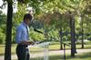 Karl Magnuson, senior engineering major, gives a dedicatory prayer during the groundbreaking ceremony for the new library. - Photo by Anne Richoux