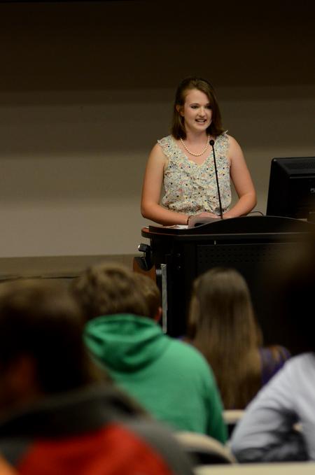 Christa Seyler, freshman nursing major, gives a campaign speech during a Student Senate meeting. 
