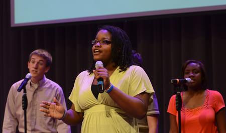 Treasure Hightower, senior digital media studies major, sings with the MOSAIC choir during chapel. Also pictured is Zac McMillian, sophomore intercultural studies major, and Gabby Bonner, freshman biology major.
