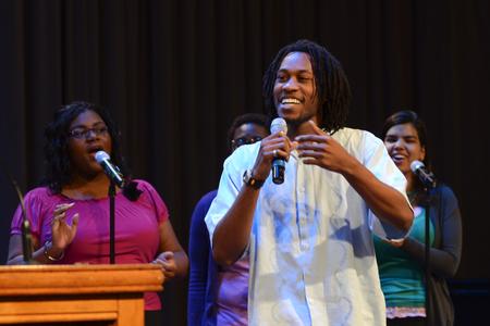 Derique Cannon, junior electrical engineering major, sings with the MOSAIC choir during chapel. Also pictured is Kayla Hardin, sophomore nursing major, and Gabi Simas, freshman chemistry major.