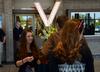 Jamie Blurton, junior social work major, greets attendees at the 15th annual Variety Show, held at the Carl Perkins Civic Center. - Photo by Jacob Moore