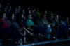 The audience gets excited as the 15th annual Variety Show begins. - Photo by Anne Richoux