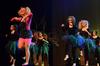 Cassie Osborn, junior social work major, performs as one of the three little pigs along with other "Once Upon A Time" members at the 15th Annual Variety Show.  - Photo by Ebbie Davis
