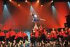 Claudia Velasco, junior accounting major, stands tall as she says farewell at Zeta Tau Alpha's performance in the 15th annual Variety Show. - Photo by Morris Abernathy