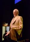 Terry Bradshaw, former NFL quarterback and current FOX Sports analyst, gets down on his knee while telling a story from his past to the audience of the Roy L. White Legacy Golf & Gala. - Photo by Zac Calvert