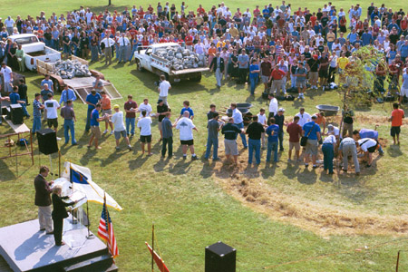 After all students passed through the line, several students made an assembly line to finish the removing of the stone altar during the September 11 Service of Remembrance and Response.