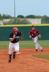 Kian Jost, senior mechanical engineering major, runs for third base during a game against Cumberland University in the TransSouth Conference Tournament. - Photo by Jacob Moore