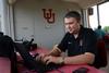 Steven Aldridge, director of sports information, works at the Fesmire Field House during a Bulldog baseball game. - Photo by Jacob Moore