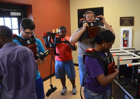 Students suit up for a game of laser tag in the Bowld Commons during May Day.