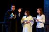 Gavin Richardson, professor of English, performs a dramatic reading of "The Fall of Lucifer" with Mary Laarz, junior English major, and Holly Owens, senior music major, during the Scholarship Symposium. - Photo by Jacob Moore