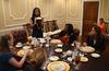 Renee Jones, associate director of the Vocatio Center for Life Calling and Career, discusses the direction items should be passed in a formal dining situation during the 2012 Etiquette Dinner. - Photo by Jacob Moore