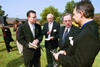 Todd Brady, Richard Joiner, President David S. Dockery, and Michael Mallard discuss the agenda for the memorial service on Sept. 11, 2002. - Photo by Jim Veneman