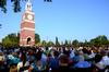 Students, family, faculty and staff gather on the great lawn to celebrate spring graduation.  - Photo by Anne Richoux