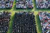 An exceptionally large crowd listens to Carol M. Swain, professor of political science and law at Vanderbilt University, give the commencement address at spring graduation. - Photo by Kristi McMurry