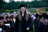 Katherine Pullen, Tigrett Medal recipient, walks forward to receive her award at spring graduation.  - Photo by Ebbie Davis