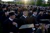 Rob Calvert, engineering graduate, smiles after receiving his diploma at spring graduation.  - Photo by Ebbie Davis