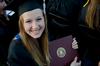 Katherine Pullen, Tigrett Medal recipient, grins with her diploma at spring graduation.  - Photo by Ebbie Davis