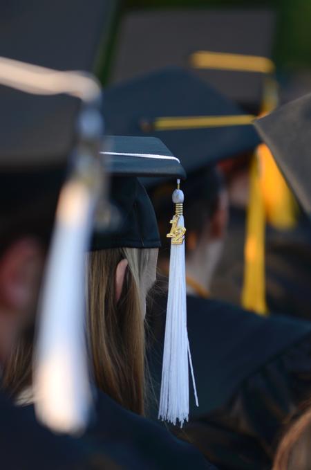 The class of 2012 listens to the commencement address and anxiously awaits their time to receive their diplomas.