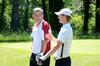 Andy Rushing, head golf coach, chats with Brett Barry, junior, on the golf course.  - Photo by Zac Calvert