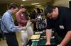 Students make connections with representatives from various companies during the Engineering Expo.  - Photo by Jacob Moore